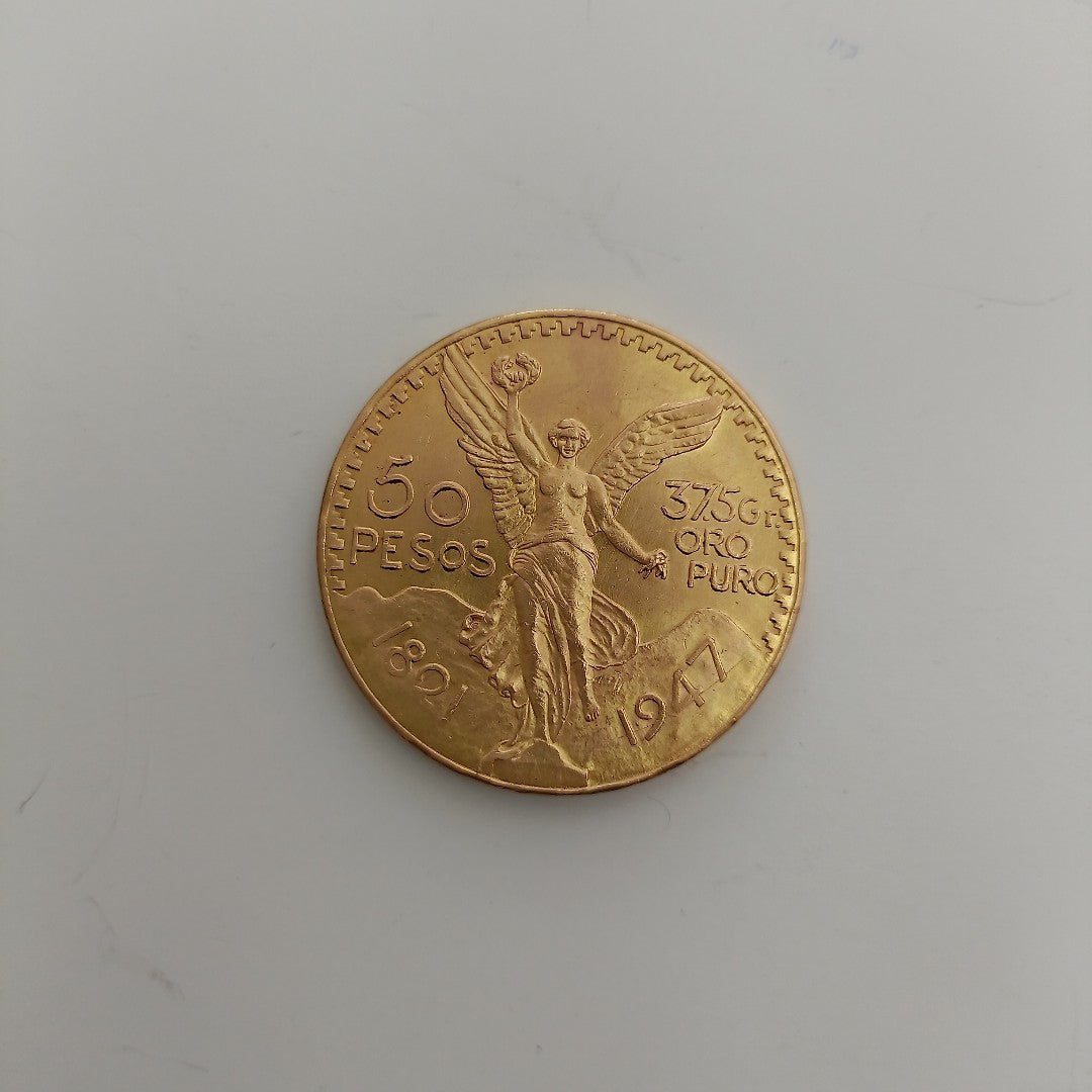 K1 41,60 GRMS - DTO. 0,00 GRMS - 21 K - AVALÚO 71884,80 * IDENTIFICACIÓN MONEDA NOMINATIVA * MONEDAS PESOS 50 PESOS (SEMINUEVO)