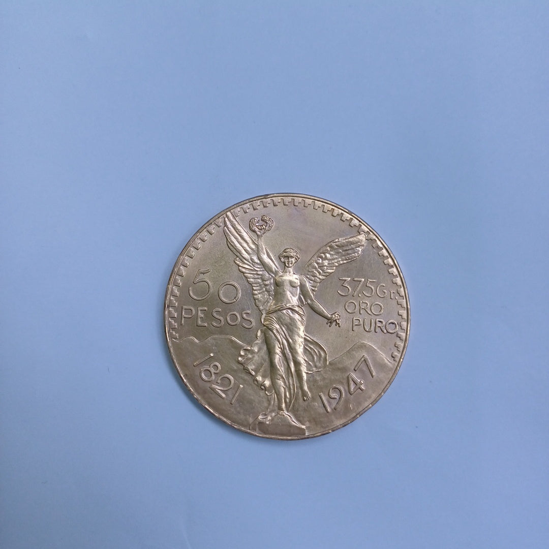 K1 41.6 GRMS - DESC. 0 GRAMOS - 21 K - AVALÚO 61776 * * IDENTIFICACIÓN MONEDA NOMINATIVA. * MONEDAS PESOS 50 PE (SEMINUEVO)