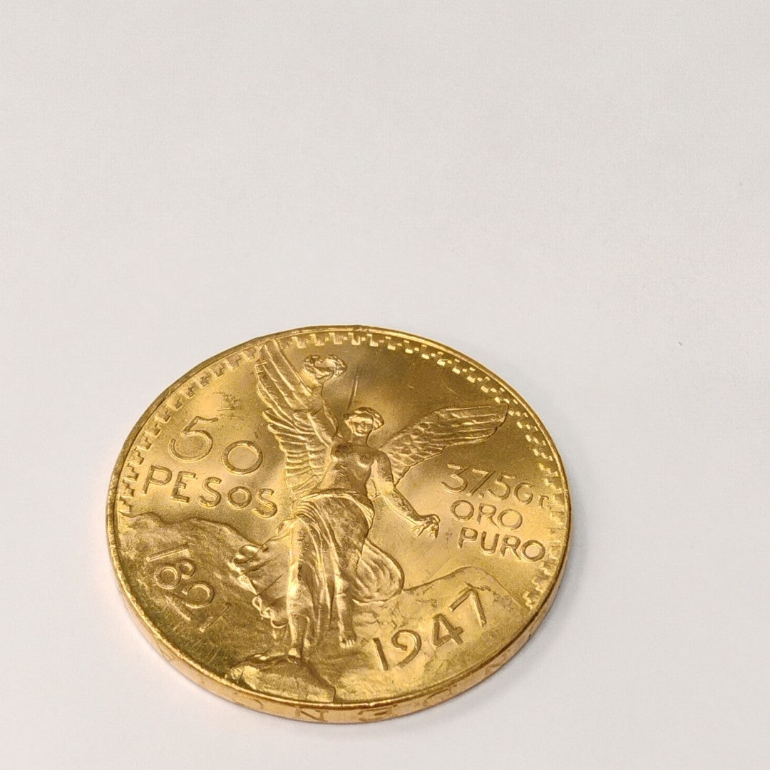 K1 41,60 GRMS - DTO. 0,00 GRMS - 21 K - AVALÚO 79534,21 * IDENTIFICACIÓN MONEDA NOMINATIVA * MONEDAS PESOS 50 PESOS (SEMINUEVO)