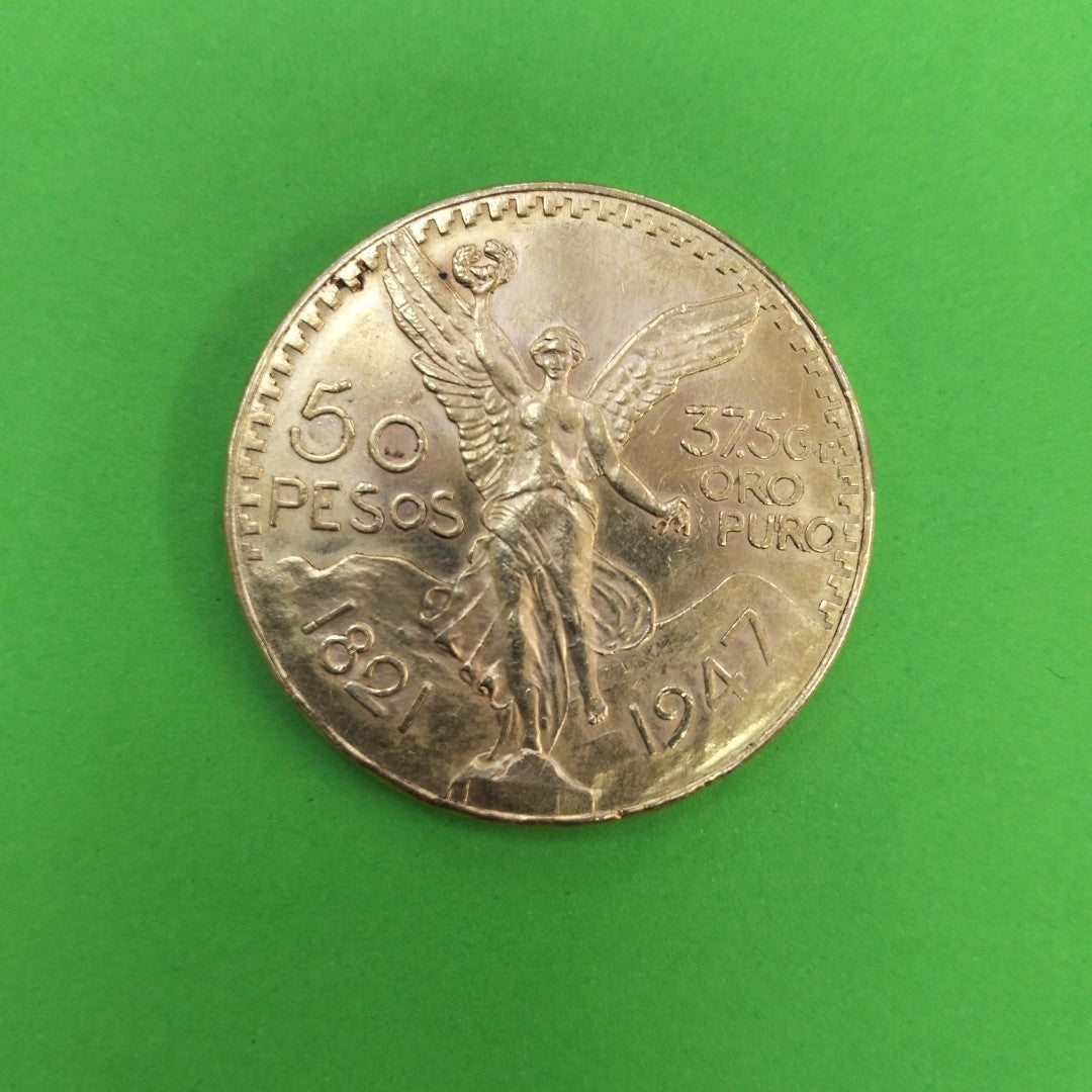 K1 41,60 GRMS - DTO. 0,00 GRMS - 21 K - AVALÚO 77126,40 * IDENTIFICACIÓN MONEDA NOMINATIVA * MATERIALES ORO * OBSERV (SEMINUEVO)