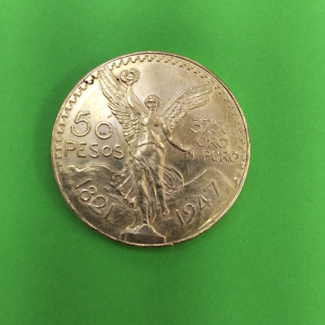 K1 41,60 GRMS - DTO. 0,00 GRMS - 21 K - AVALÚO 77126,40 * IDENTIFICACIÓN MONEDA NOMINATIVA * MATERIALES ORO * OBSERV (SEMINUEVO)