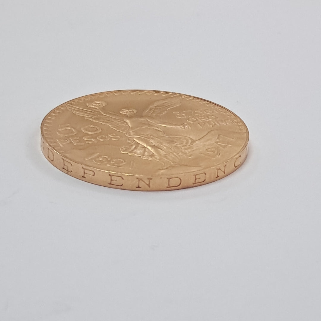 K1 41,60 GRMS - DTO. 0,00 GRMS - 21 K - AVALÚO 76003,20 * IDENTIFICACIÓN MONEDA NOMINATIVA * MONEDAS PESOS 50 PESOS (SEMINUEVO)