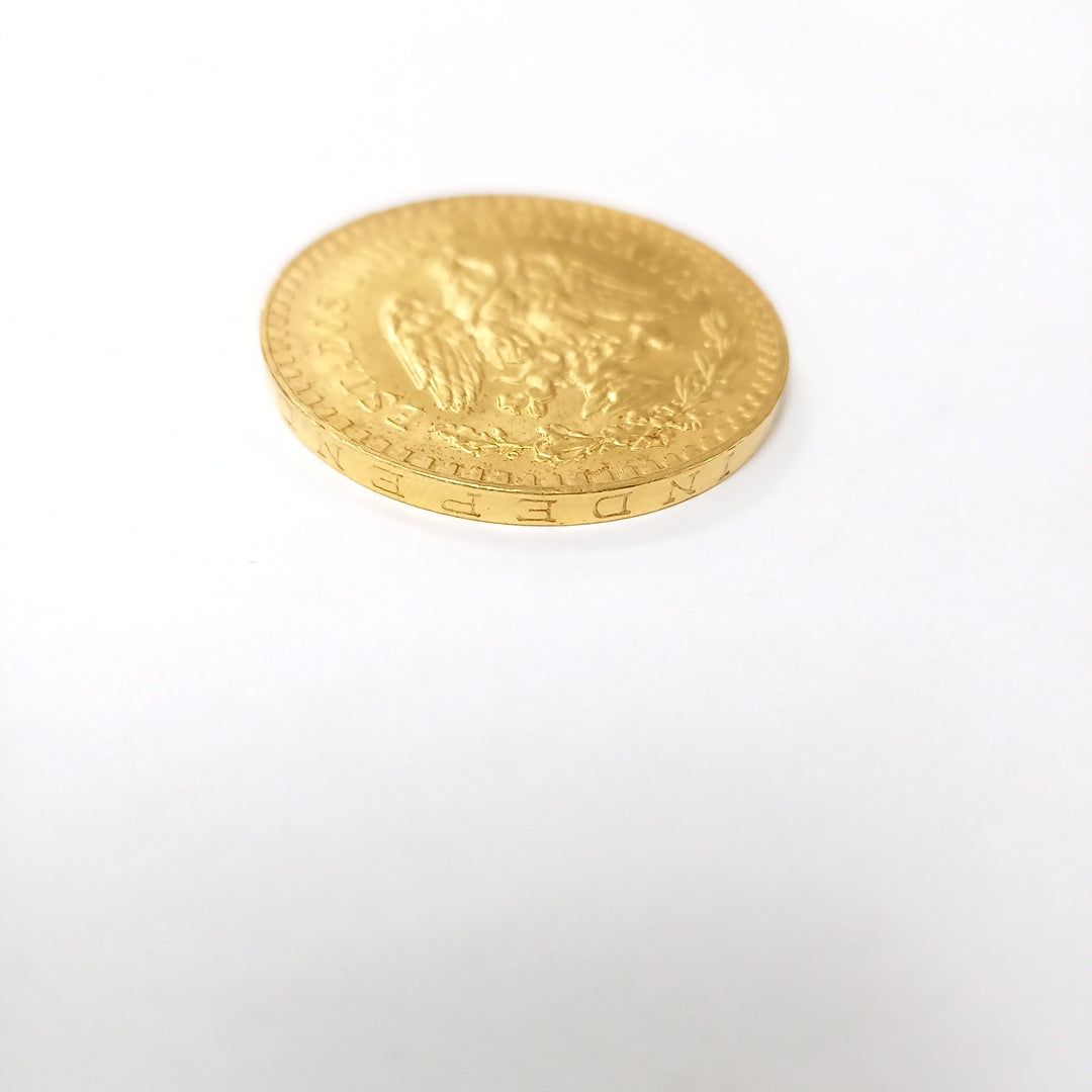 K1 41.6 GRMS - DESC. 0 GRAMOS - 21 K - AVALÚO 71884.8 * * IDENTIFICACIÓN MONEDA NOMINATIVA. * MONEDAS PESOS 50 PESO (SEMINUEVO)