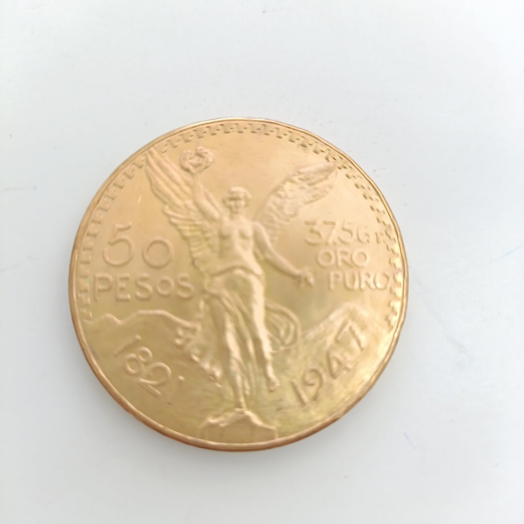 K1 41,60 GRMS - DTO. 0,00 GRMS - 21 K - AVALÚO 71884,80 * IDENTIFICACIÓN MONEDA NOMINATIVA * MONEDAS PESOS 50 PESOS (SEMINUEVO)