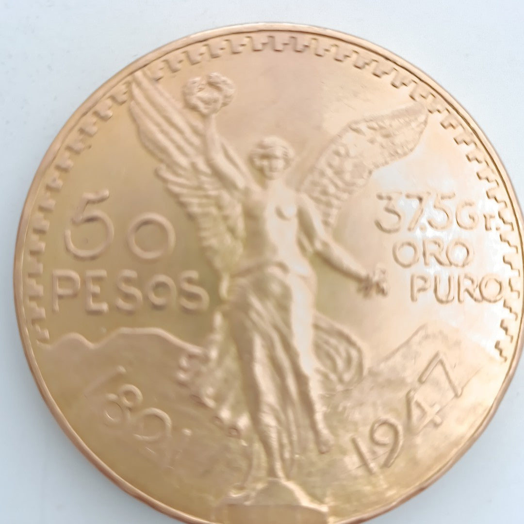 K1 41,60 GRMS - DTO. 0,00 GRMS - 21 K - AVALÚO 71884,80 * IDENTIFICACIÓN MONEDA NOMINATIVA * MONEDAS PESOS 50 PESOS (SEMINUEVO)