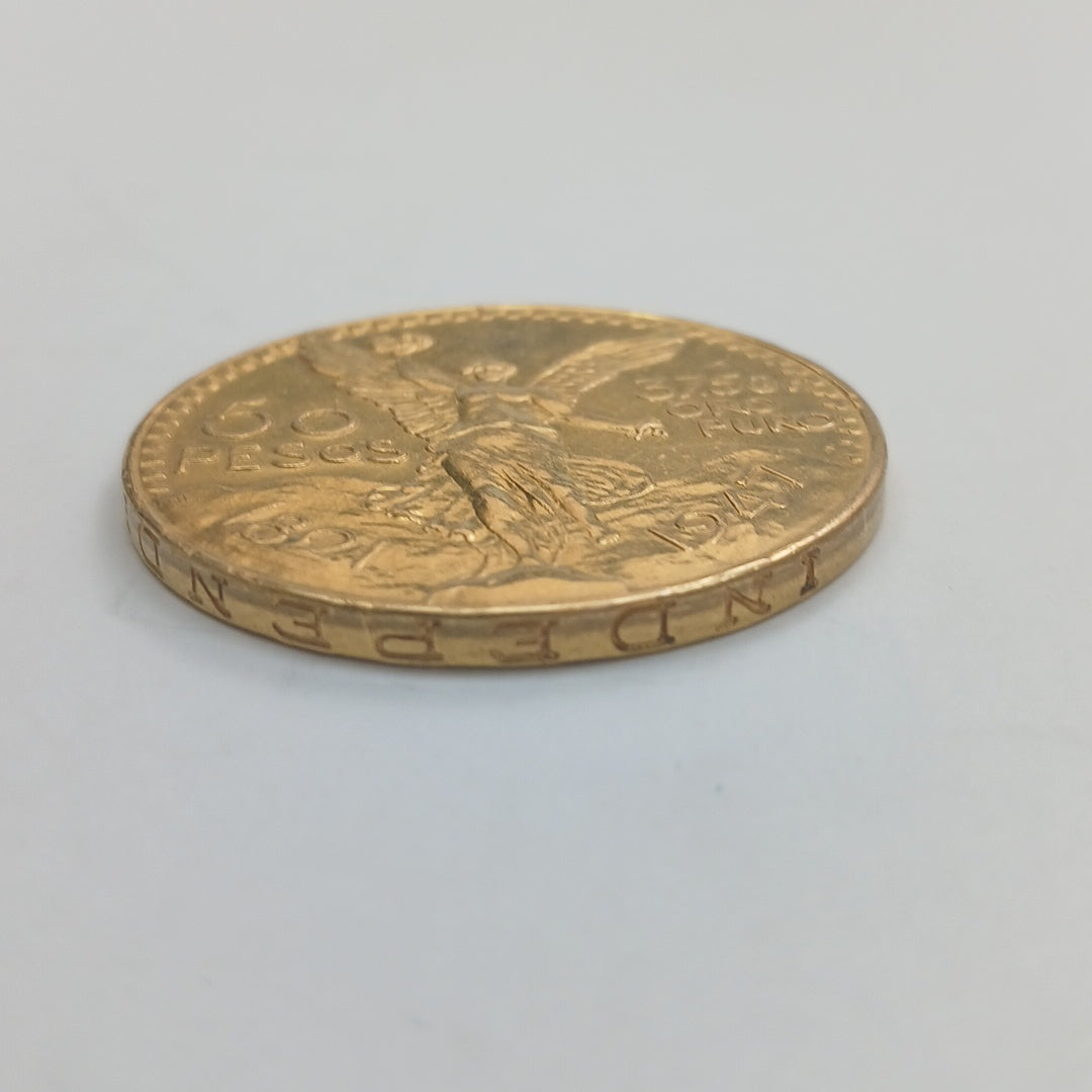 K1 41,60 GRMS - DTO. 0,00 GRMS - 21 K - AVALÚO 79372,80 * IDENTIFICACIÓN MONEDA NOMINATIVA * MATERIALES ORO * OBSERV (SEMINUEVO)