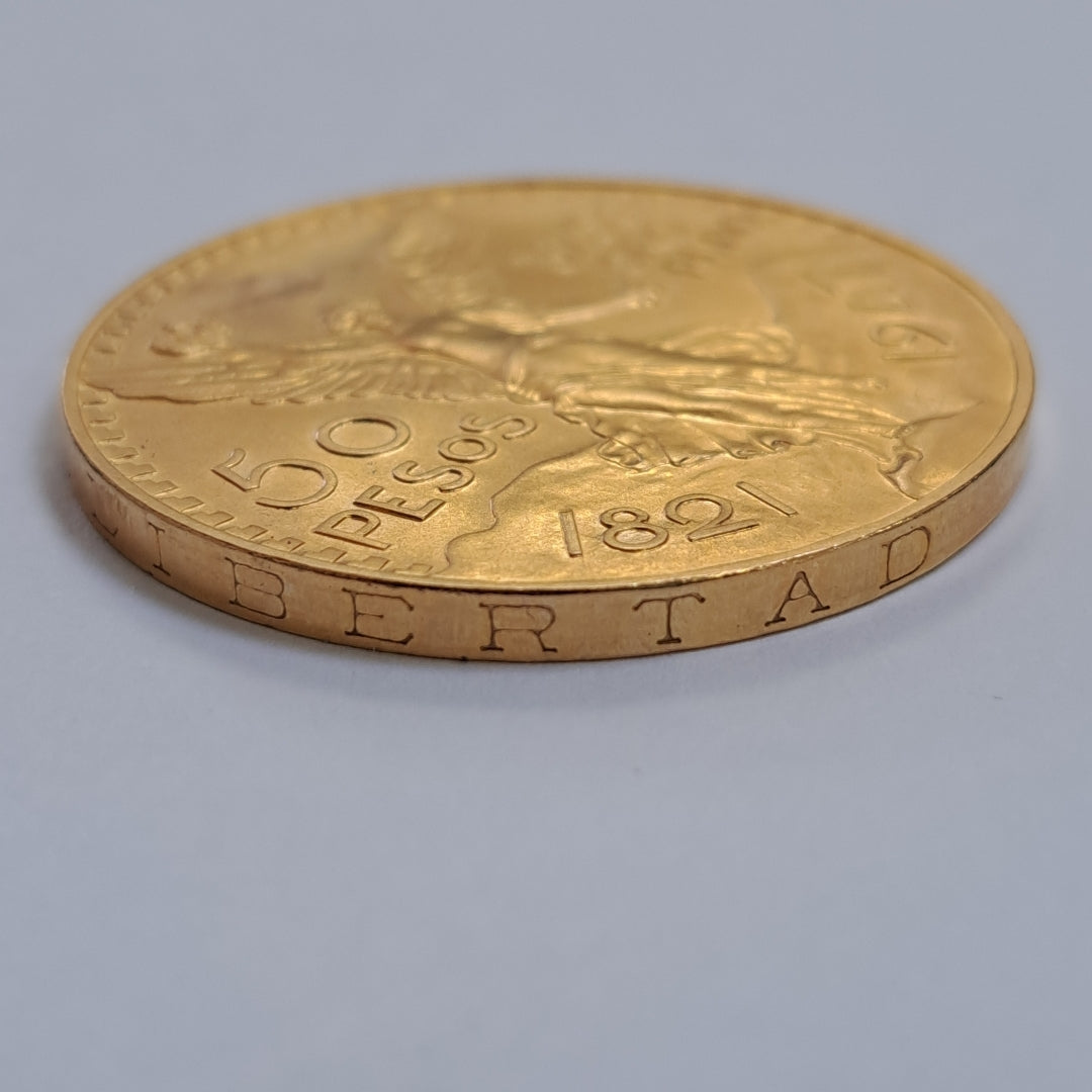 K1 41,60 GRMS - DTO. 0,00 GRMS - 21 K - AVALÚO 79372,80 * IDENTIFICACIÓN MONEDA NOMINATIVA * MONEDAS PESOS 50 PESOS (SEMINUEVO)