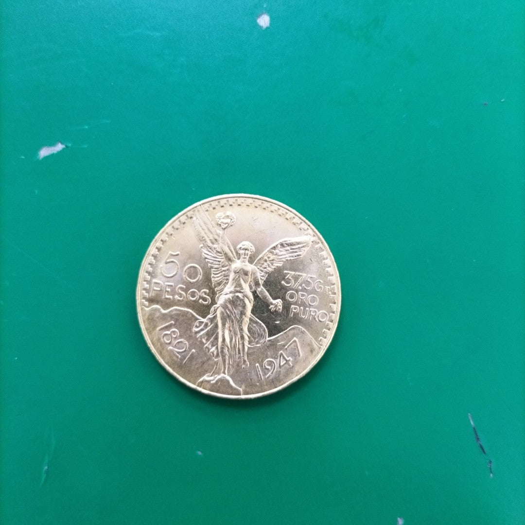 K1 41,60 GRMS - DTO. 0,00 GRMS - 21 K - AVALÚO 80496,00 * IDENTIFICACIÓN MONEDA NOMINATIVA * MONEDAS PESOS 50 PESOS (SEMINUEVO)