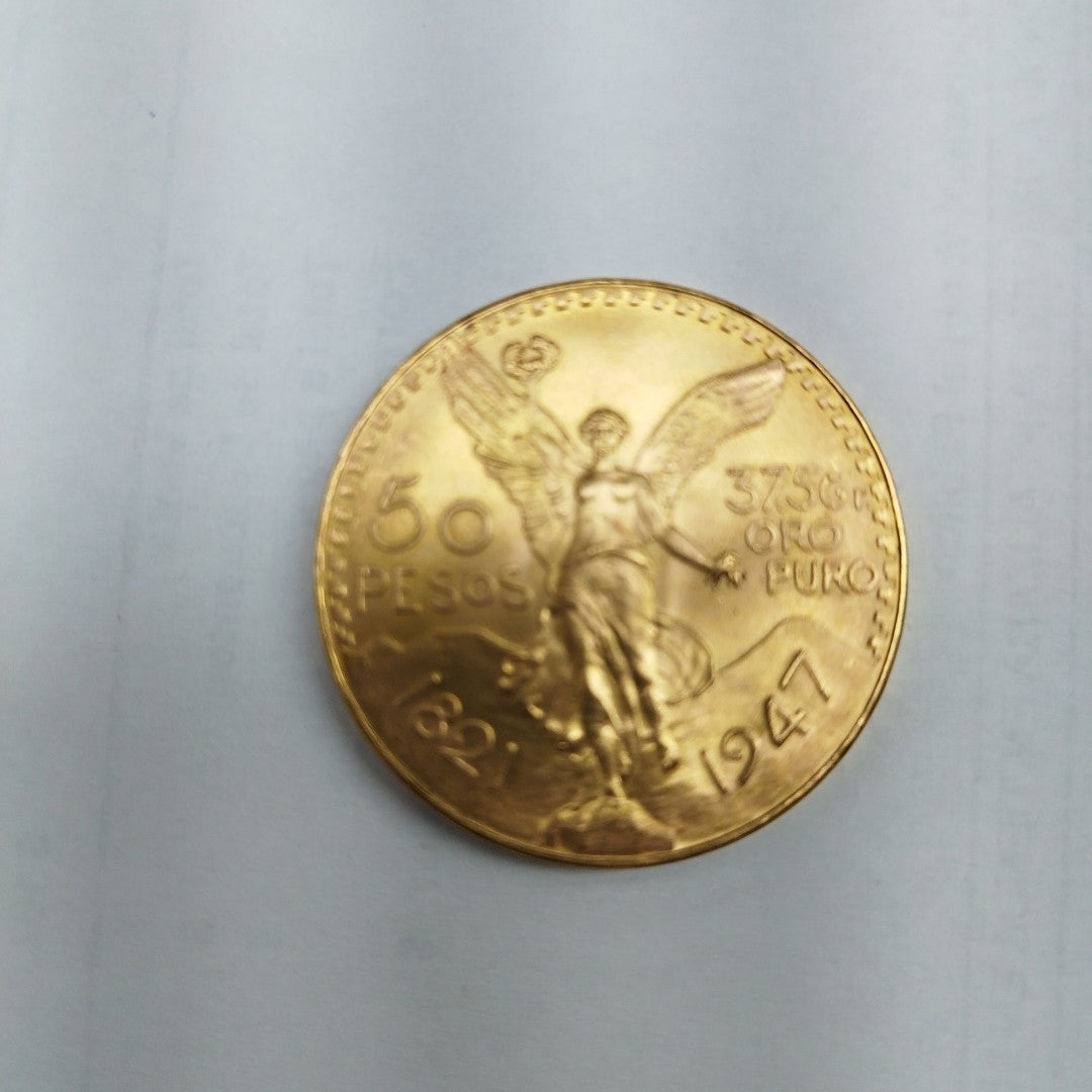 K1 41,60 GRMS - DTO. 0,00 GRMS - 21 K - AVALÚO 79372,80 * IDENTIFICACIÓN MONEDA NOMINATIVA * MONEDAS PESOS 50 PESOS (SEMINUEVO)