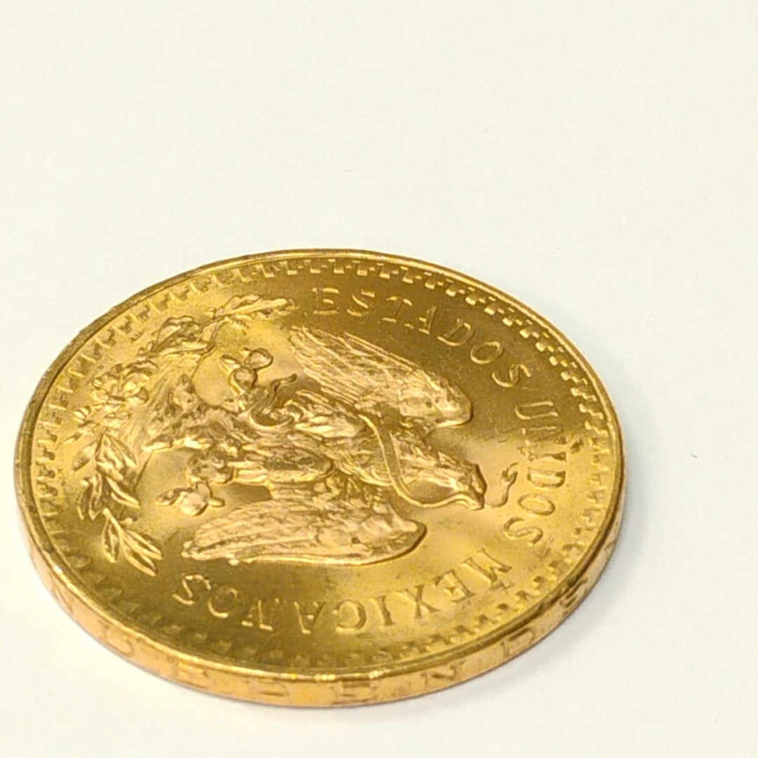 K1 41,60 GRMS - DTO. 0,00 GRMS - 21 K - AVALÚO 79534,21 * IDENTIFICACIÓN MONEDA NOMINATIVA * MONEDAS PESOS 50 PESOS (SEMINUEVO)