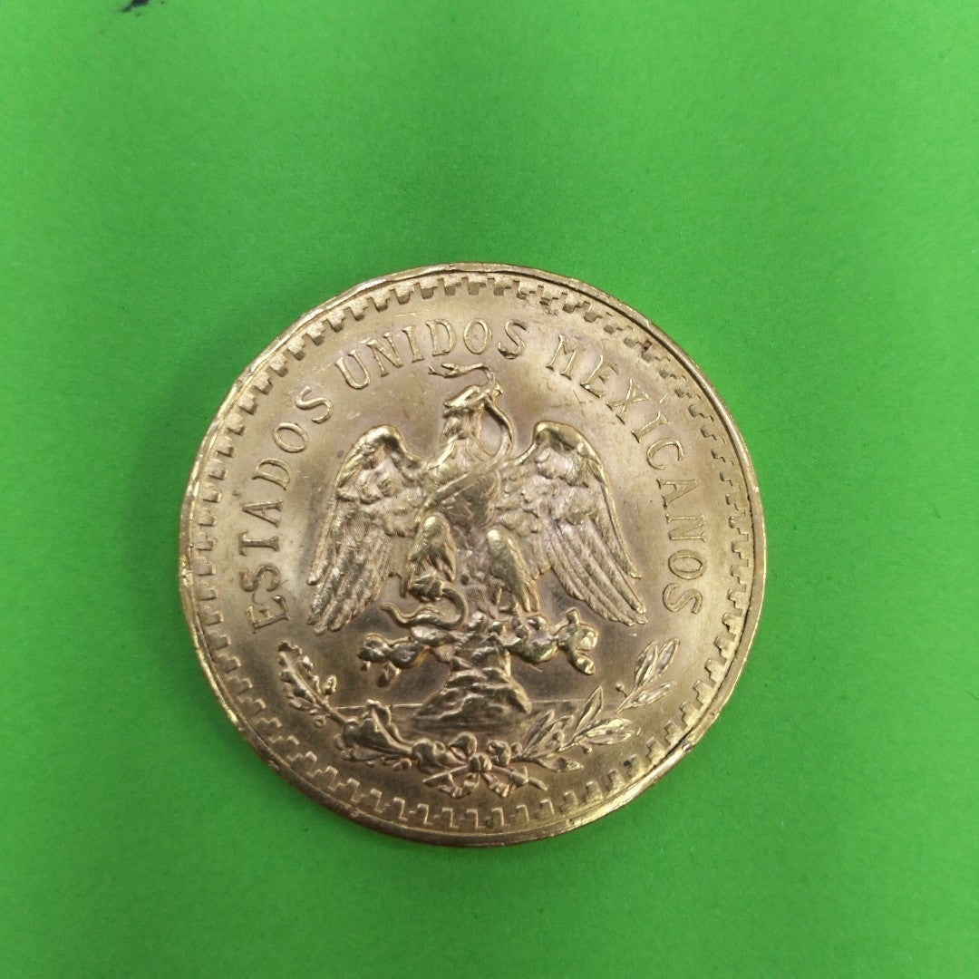 K1 41,60 GRMS - DTO. 0,00 GRMS - 21 K - AVALÚO 77126,40 * IDENTIFICACIÓN MONEDA NOMINATIVA * MATERIALES ORO * OBSERV (SEMINUEVO)