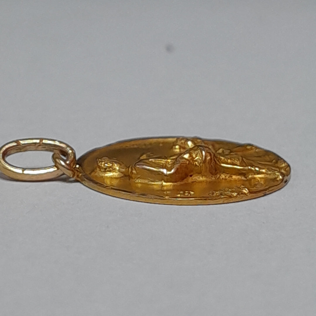MEDALLA RELIGIOSA. ORO. 10 K 1.5 GRMS (SEMINUEVO)
