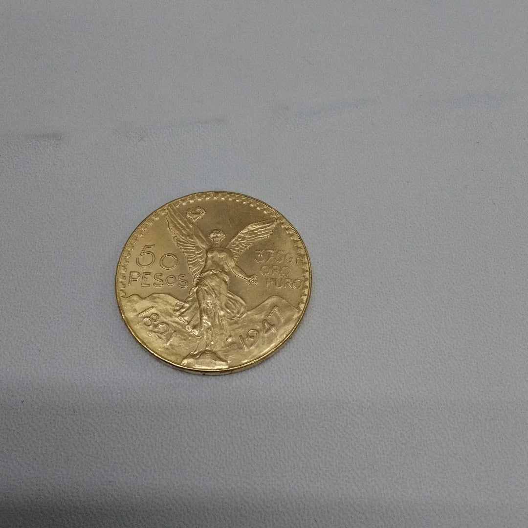 K1 41,60 GRMS - DTO. 0,00 GRMS - 21 K - AVALÚO 59155,20 * IDENTIFICACIÓN  MONEDA NOMINATIVA * MONEDAS PESOS  50 PESOS (SEMINUEVO)