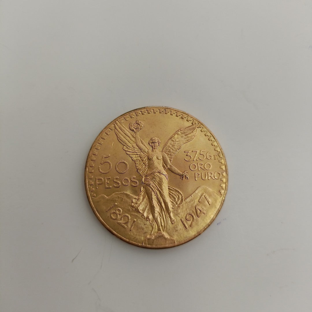 K1 41,60 GRMS - DTO. 0,00 GRMS - 21 K - AVALÚO 71884,80 * IDENTIFICACIÓN  MONEDA NOMINATIVA * MONEDAS PESOS  50 PESOS (SEMINUEVO)