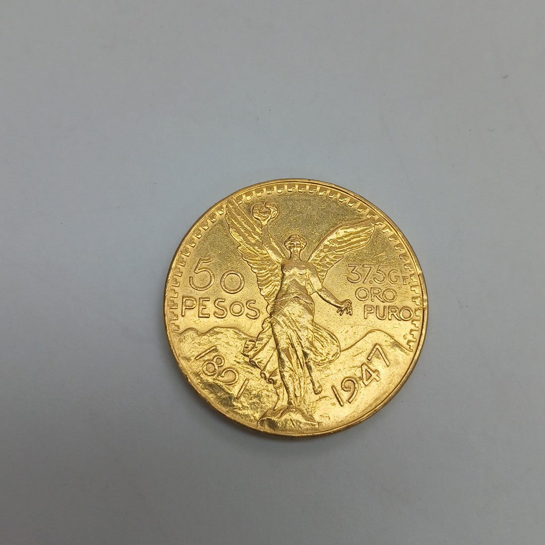 K1 41,60 GRMS - DTO. 0,00 GRMS - 21 K - AVALÚO 79372,80 * IDENTIFICACIÓN  MONEDA NOMINATIVA * MATERIALES  ORO * OBSERV (SEMINUEVO)