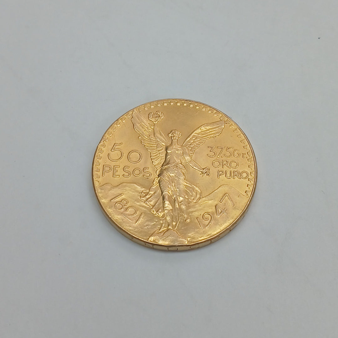 K1 41,60 GRMS - DTO. 0,00 GRMS - 21 K - AVALÚO 79372,80 * IDENTIFICACIÓN  MONEDA NOMINATIVA * MATERIALES  ORO * CANTID (SEMINUEVO)