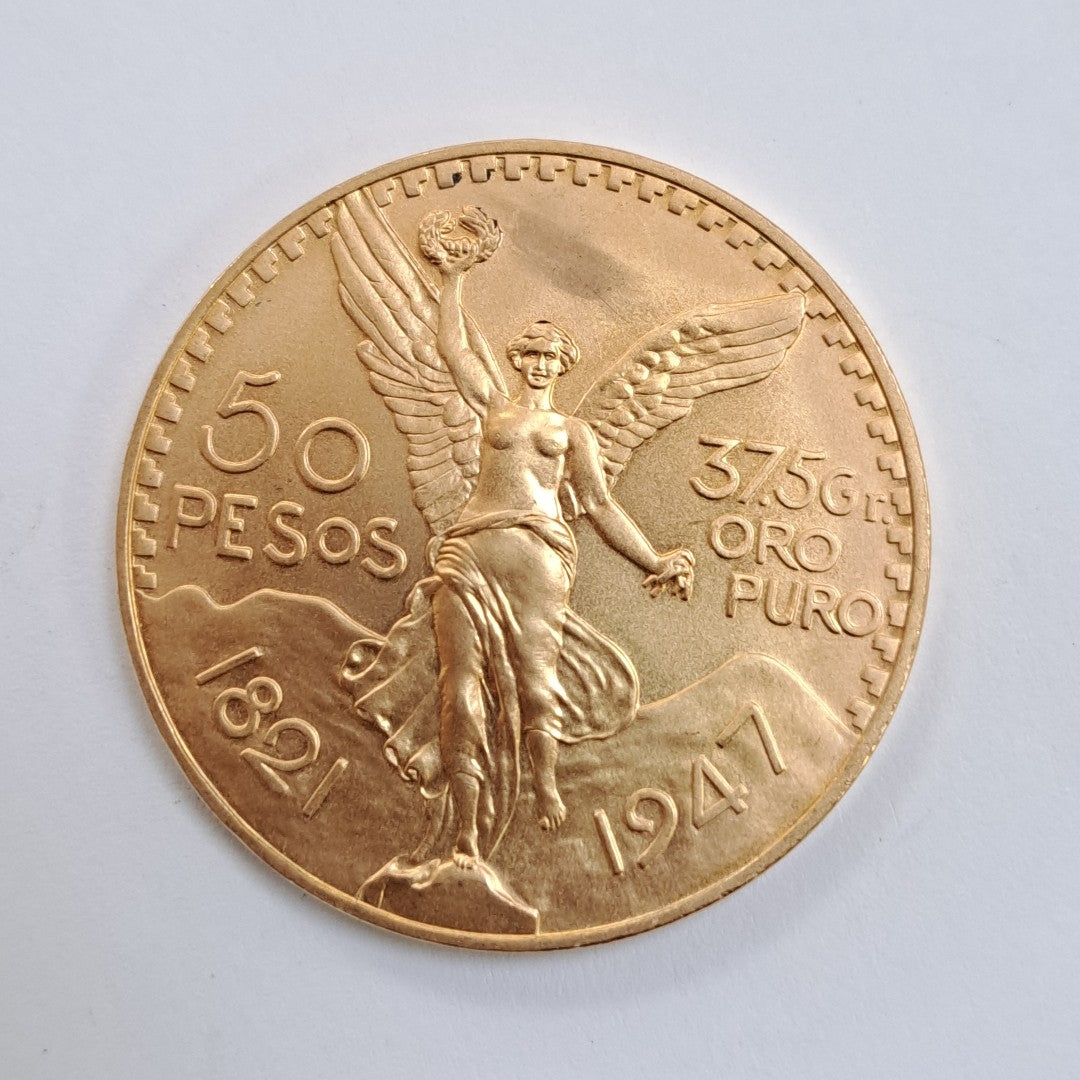 K1 41,60 GRMS - DTO. 0,00 GRMS - 21 K - AVALÚO 79372,80 * IDENTIFICACIÓN  MONEDA NOMINATIVA * MONEDAS PESOS  50 PESOS (SEMINUEVO)