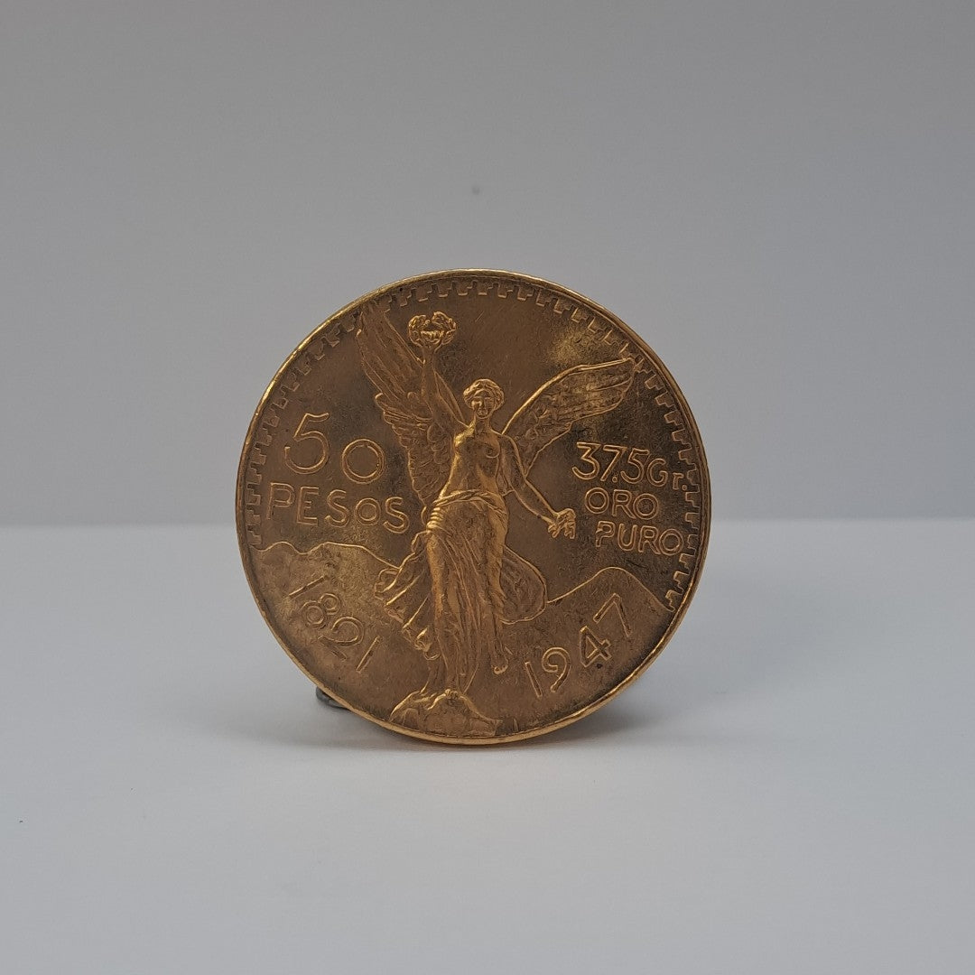K1 41,60 GRMS - DTO. 0,00 GRMS - 21 K - AVALÚO 79372,80 * IDENTIFICACIÓN  MONEDA NOMINATIVA * MONEDAS PESOS  50 PESOS (SEMINUEVO)