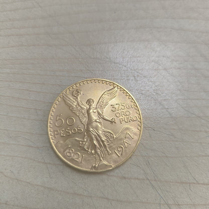 K1 41,60 GRMS - DTO. 0,00 GRMS - 21 K - AVALÚO 71884,80 * IDENTIFICACIÓN  MONEDA NOMINATIVA * MONEDAS PESOS  50 PESOS (SEMINUEVO)