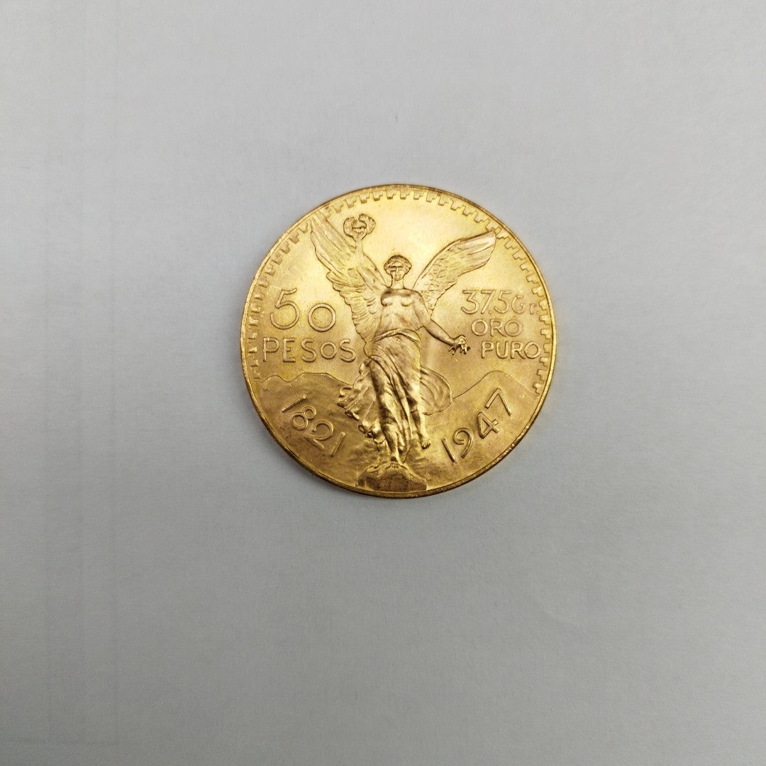 K1 41,60 GRMS - DTO. 0,00 GRMS - 21 K - AVALÚO 79372,80 * IDENTIFICACIÓN  MONEDA NOMINATIVA * MONEDAS PESOS  50 PESOS (SEMINUEVO)