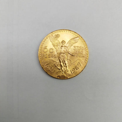 K1 41,60 GRMS - DTO. 0,00 GRMS - 21 K - AVALÚO 79372,80 * IDENTIFICACIÓN  MONEDA NOMINATIVA * MONEDAS PESOS  50 PESOS (SEMINUEVO)