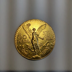 K1 41,60 GRMS - DTO. 0,00 GRMS - 21 K - AVALÚO 77688,00 * IDENTIFICACIÓN  MONEDA NOMINATIVA * MONEDAS PESOS  50 PESOS (SEMINUEVO)
