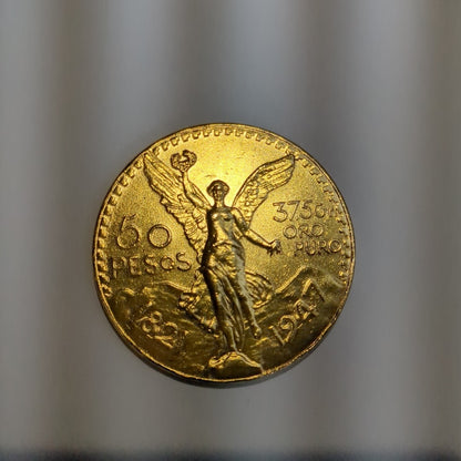 K1 41,60 GRMS - DTO. 0,00 GRMS - 21 K - AVALÚO 77688,00 * IDENTIFICACIÓN  MONEDA NOMINATIVA * MONEDAS PESOS  50 PESOS (SEMINUEVO)