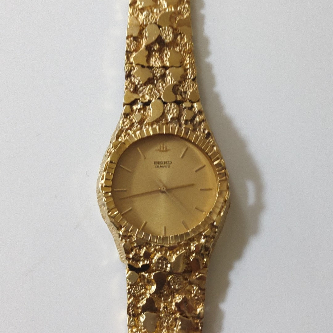 RELOJ CAJA ACERO PULSO ORO. ORO. 14 K 54.5 GRMS (SEMINUEVO)