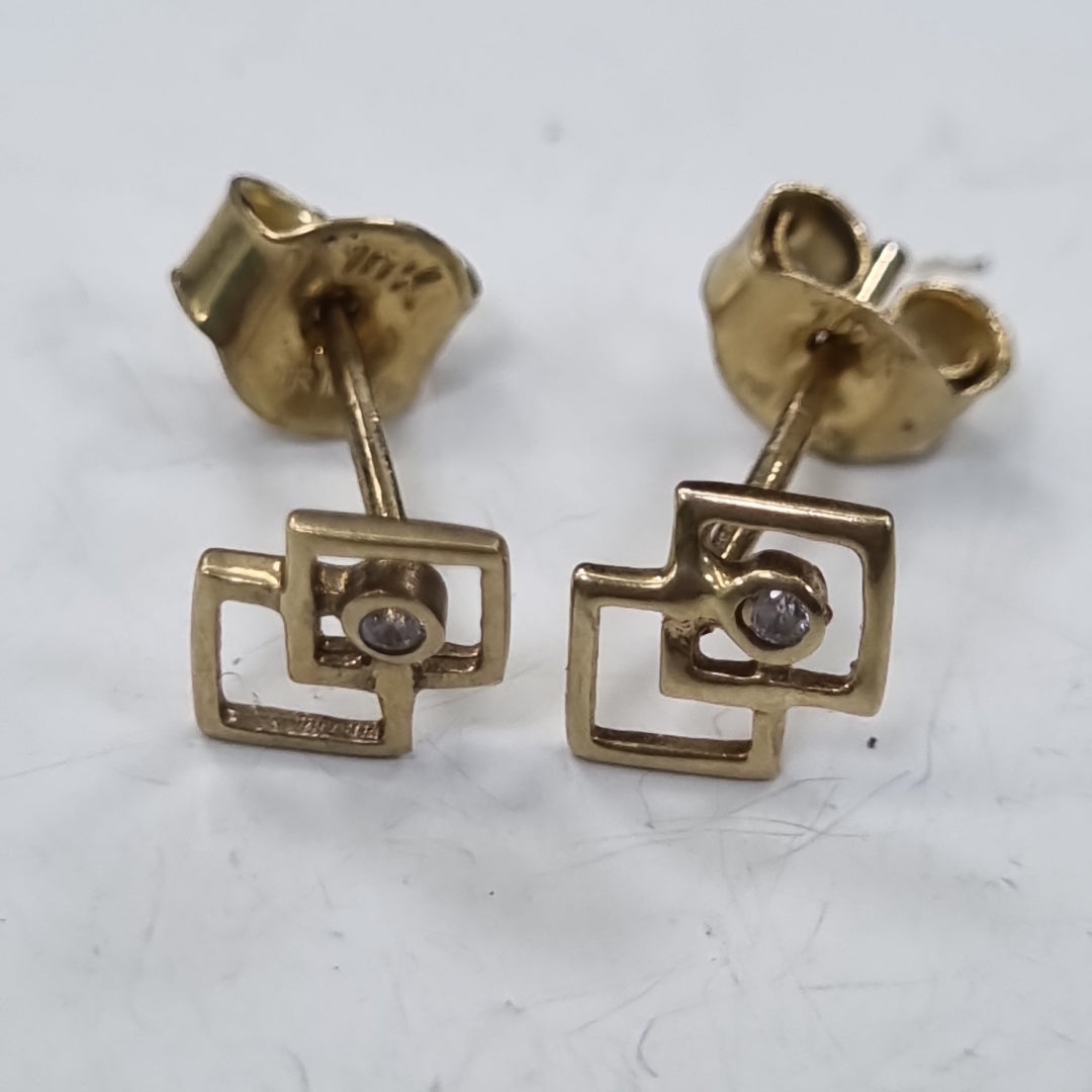 10477BRO00000B1808 FRD12 BROQUEL DE CUADRADOS CON UNA CIRCONIA ORO 14K 0.8GRS (NUEVO)