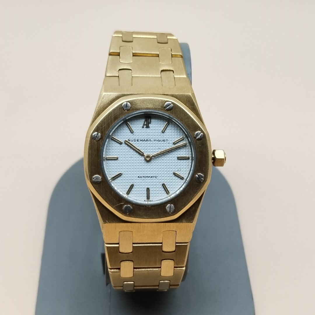 RELOJ CAJA Y PULSO ORO. ORO. 18 K 115.8 GRMS (SEMINUEVO)