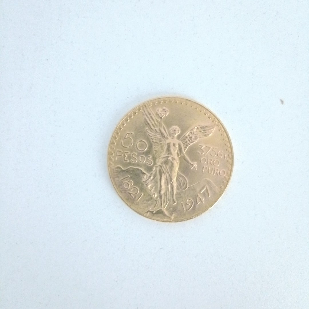 K1 41.6 GRMS - DESC.  0 GRAMOS - 21 K - AVALÚO  71884.8 * * IDENTIFICACIÓN  MONEDA NOMINATIVA. * MONEDAS PESOS  50 PESO (SEMINUEVO)