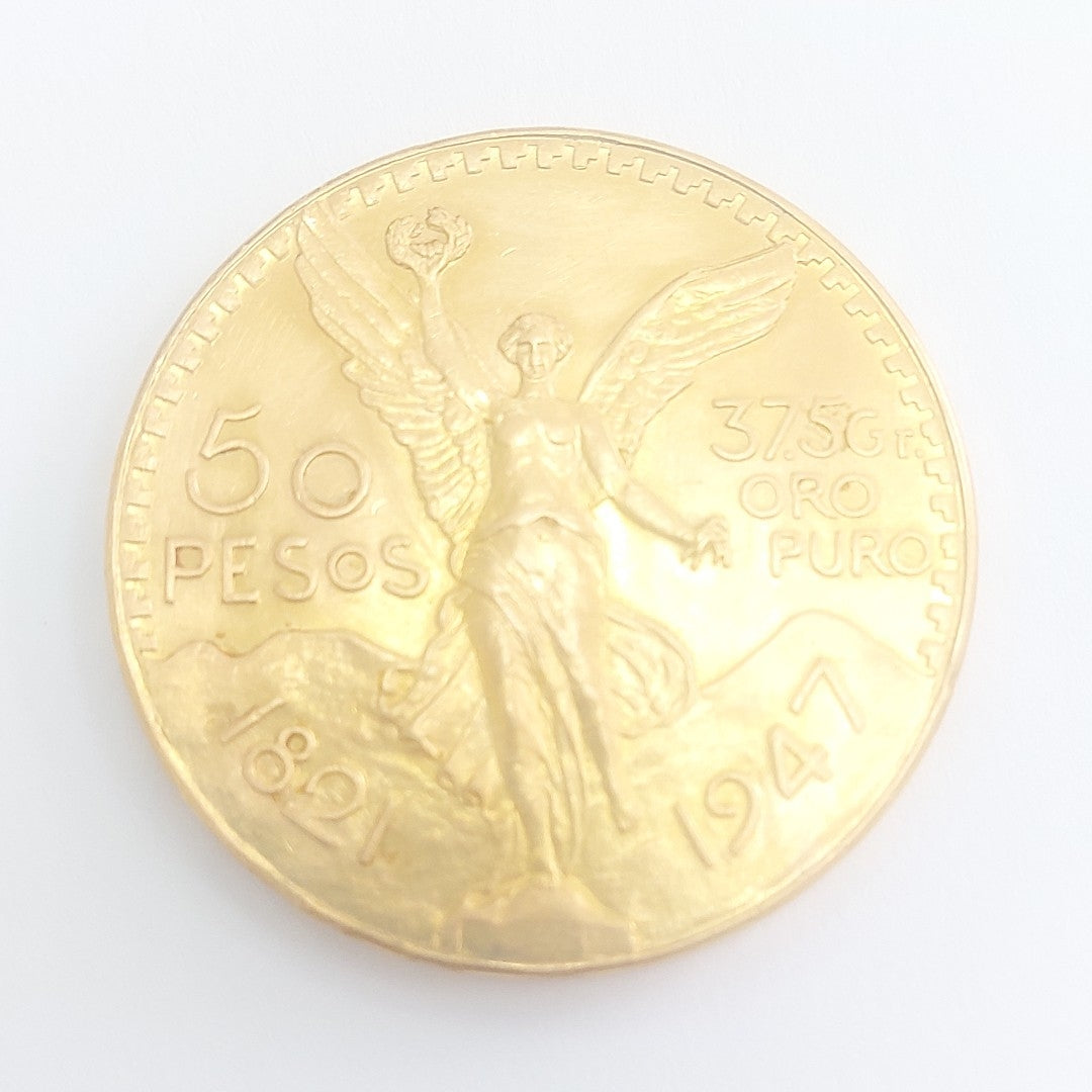 K1 41.6 GRMS - DESC.  0 GRAMOS - 21 K - AVALÚO  80870.4 * * IDENTIFICACIÓN  MONEDA NOMINATIVA. * MONEDAS PESOS  50 PESO (SEMINUEVO)