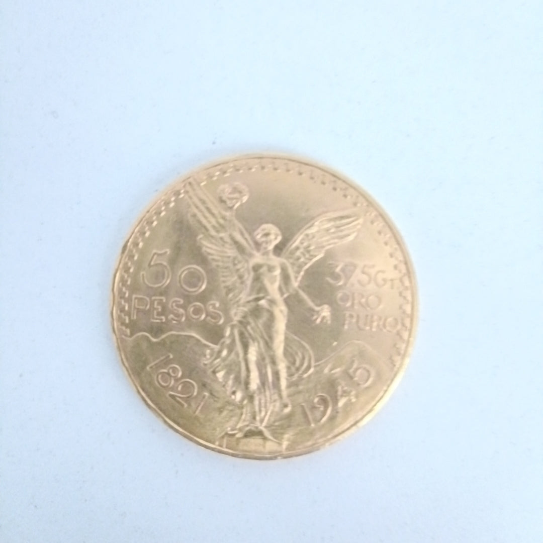 K1 41.7 GRMS - DESC.  0 GRAMOS - 21 K - AVALÚO  65302.2 * * IDENTIFICACIÓN  MONEDA NOMINATIVA. * MONEDAS PESOS  50 PESO (SEMINUEVO)
