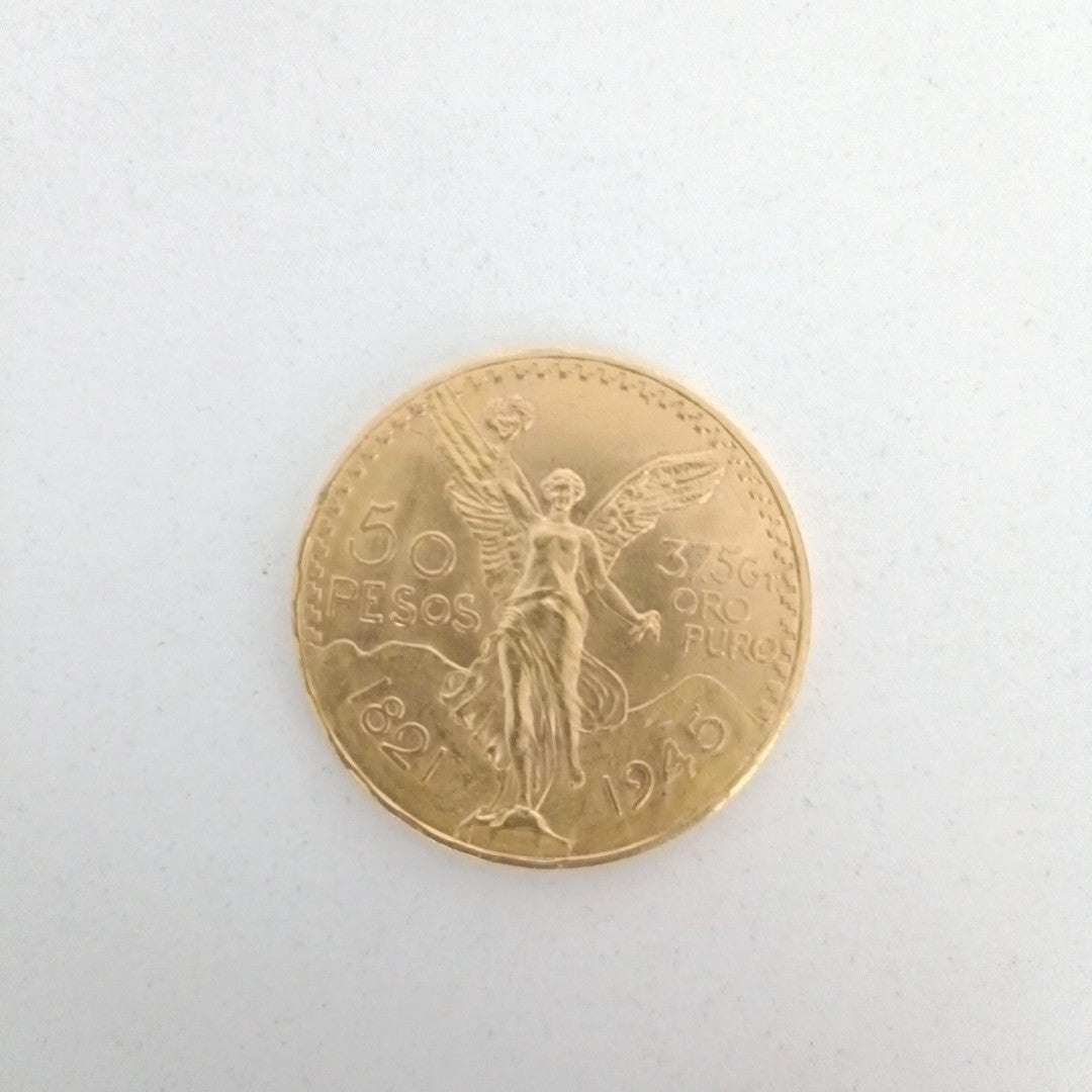 K1 41.6 GRMS - DESC.  0 GRAMOS - 21 K - AVALÚO  75254.4 * * IDENTIFICACIÓN  MONEDA NOMINATIVA. * MONEDAS PESOS  50 PESO (SEMINUEVO)