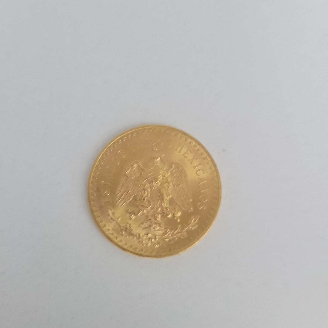 K1 41.6 GRMS - DESC.  0 GRAMOS - 21 K - AVALÚO  69638.4 * * IDENTIFICACIÓN  MONEDA NOMINATIVA. * MONEDAS PESOS  50 PESO (SEMINUEVO)
