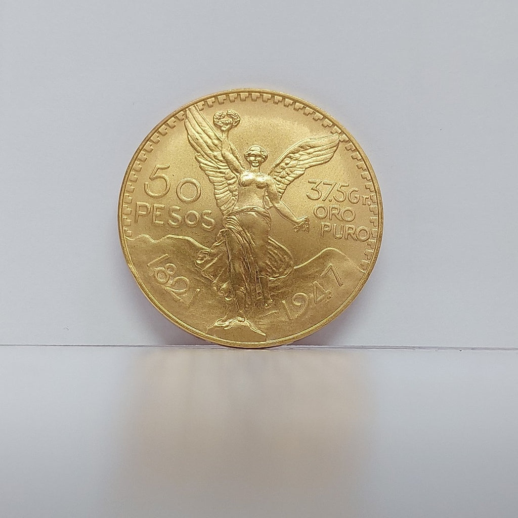 K1 41.6 GRMS - DESC.  0 GRAMOS - 21 K - AVALÚO  76377.6 * * IDENTIFICACIÓN  MONEDA NOMINATIVA. * MONEDAS PESOS  50 PESO (SEMINUEVO)