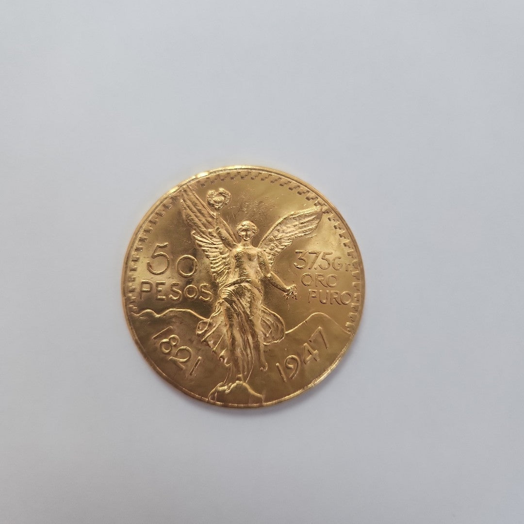 K1 41.6 GRMS - DESC.  0 GRAMOS - 21 K - AVALÚO  77688 * * IDENTIFICACIÓN  MONEDA NOMINATIVA. * MONEDAS PESOS  50 PESOS. (SEMINUEVO)