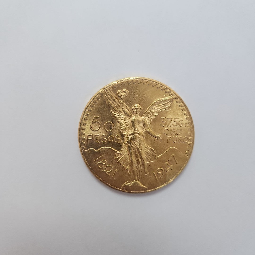 K1 41.6 GRMS - DESC.  0 GRAMOS - 21 K - AVALÚO  77688 * * IDENTIFICACIÓN  MONEDA NOMINATIVA. * MATERIALES  ORO. * CANTI (SEMINUEVO)