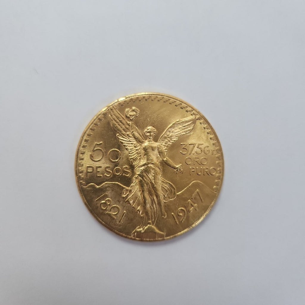 K1 41.6 GRMS - DESC.  0 GRAMOS - 21 K - AVALÚO  77688 * * IDENTIFICACIÓN  MONEDA NOMINATIVA. * MATERIALES  ORO. * CANTI (SEMINUEVO)
