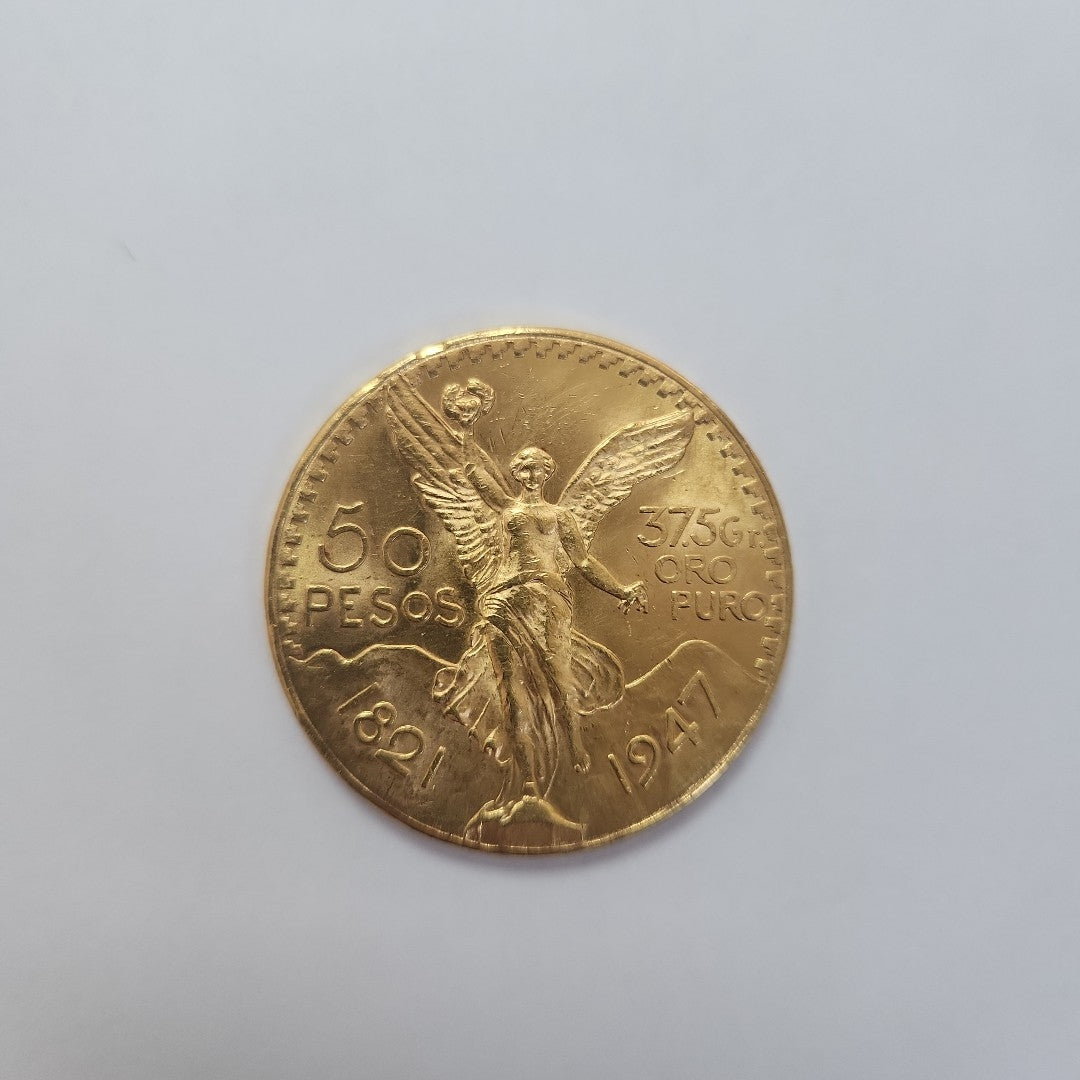 K1 41.6 GRMS - DESC.  0 GRAMOS - 21 K - AVALÚO  77688 * * IDENTIFICACIÓN  MONEDA NOMINATIVA. * MATERIALES  ORO. * CANTI (SEMINUEVO)