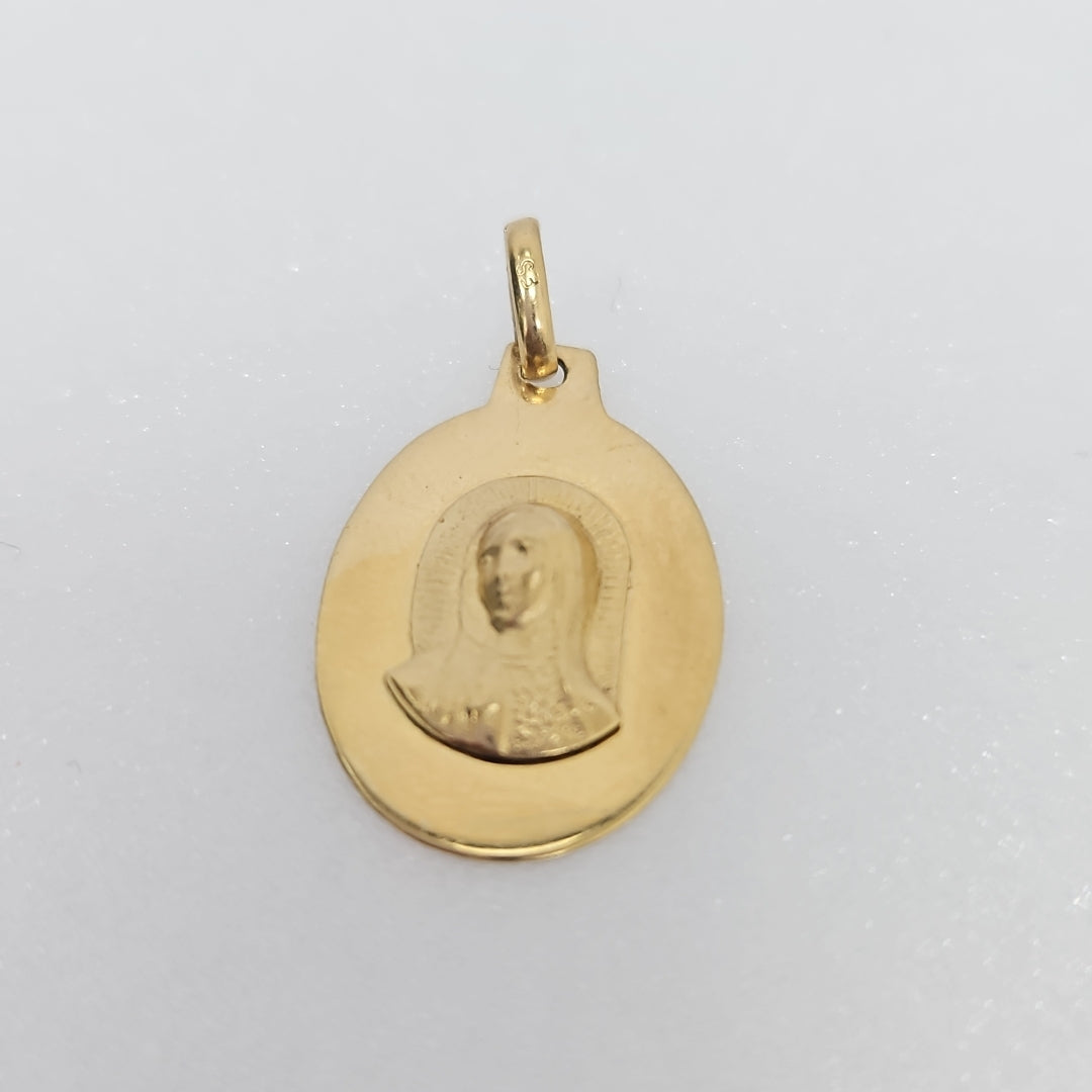 10007REL12000B120 FRD3 MEDALLA OVALADA CON IMAGEN DE LA VIRGEN AL RELIEVE ORO 14K 1.2GRS (NUEVO)