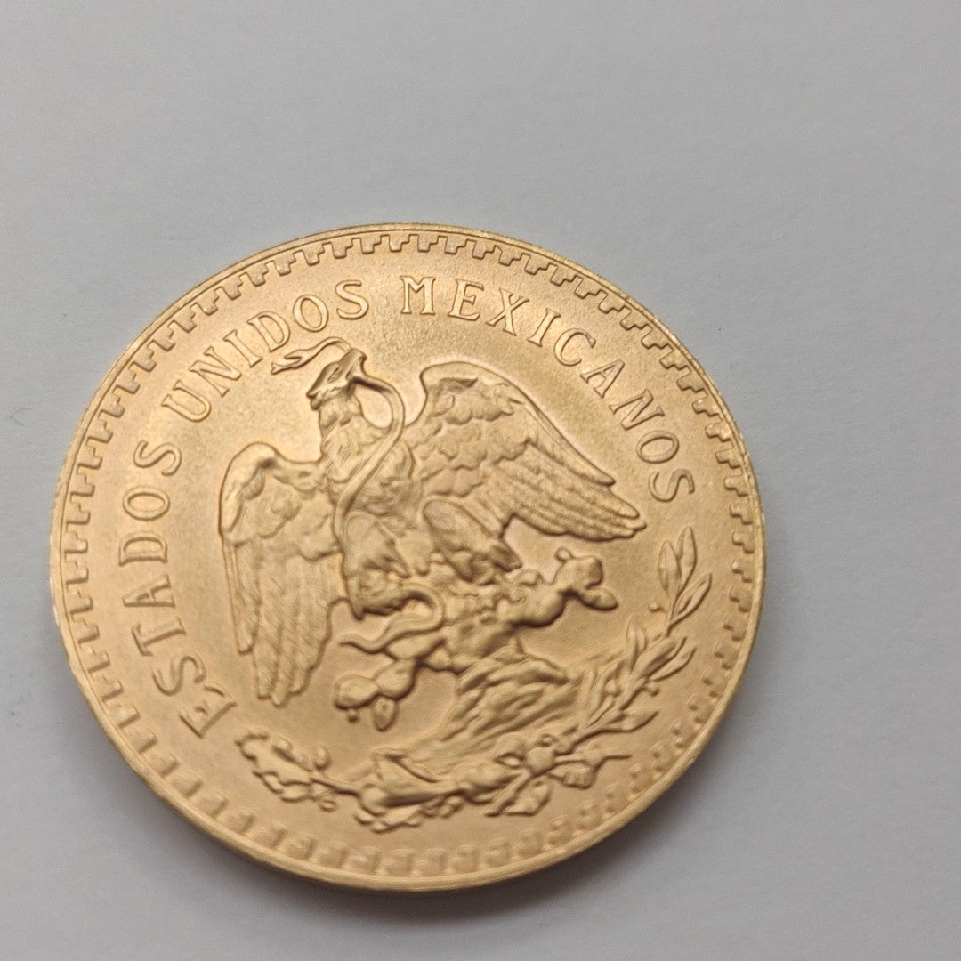 K1 41.6 GRMS - DESC.  0 GRAMOS - 21 K - AVALÚO  71884.8 * * IDENTIFICACIÓN  MONEDA NOMINATIVA. * MONEDAS PESOS  50 PESO (SEMINUEVO)