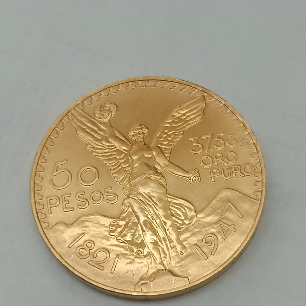 K1 41.6 GRMS - DESC.  0 GRAMOS - 21 K - AVALÚO  76377.6 * * IDENTIFICACIÓN  MONEDA NOMINATIVA. * MONEDAS PESOS  50 PESO (SEMINUEVO)