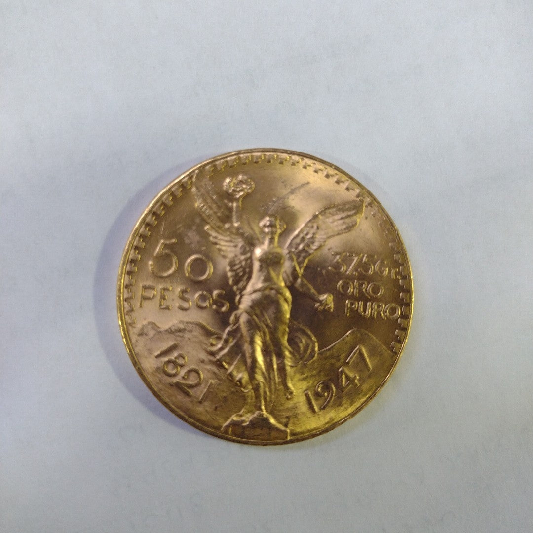 K1 41,60 GRMS - DTO. 0,00 GRMS - 21 K - AVALÚO 77126,40 * IDENTIFICACIÓN  MONEDA NOMINATIVA * MATERIALES  ORO * CANTID (SEMINUEVO)