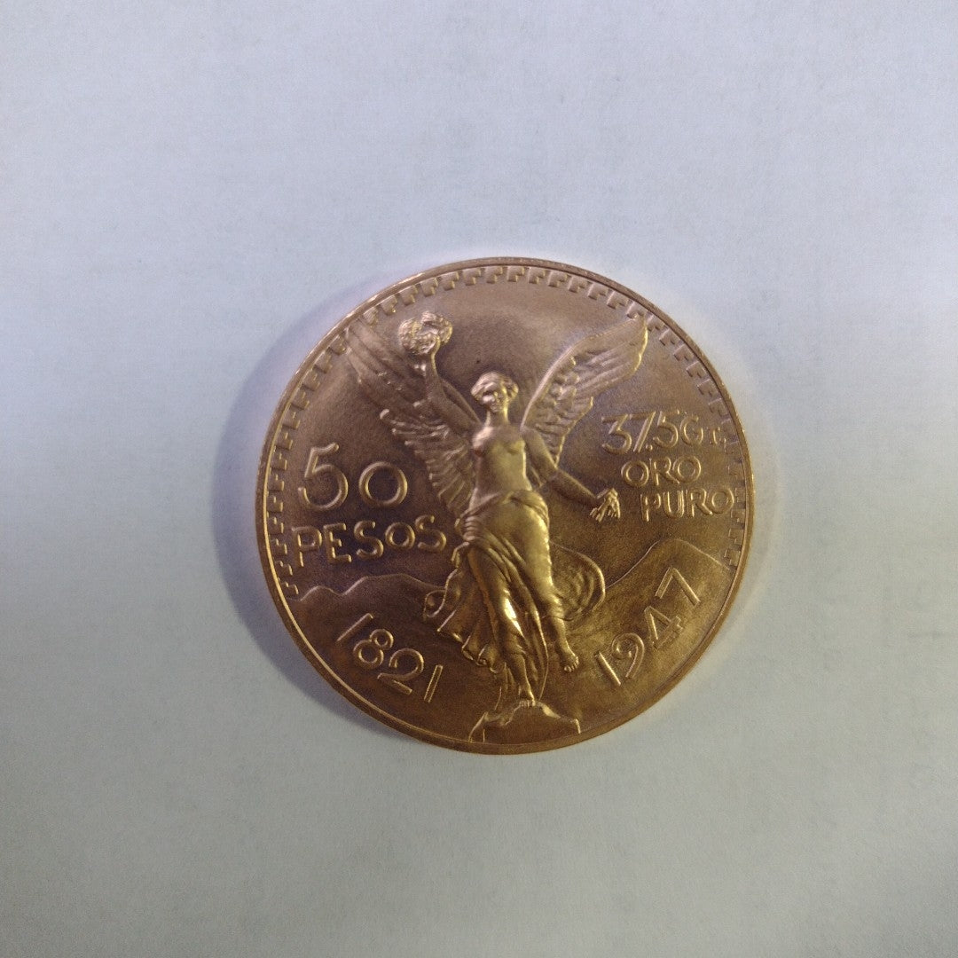 K1 41,60 GRMS - DTO. 0,00 GRMS - 21 K - AVALÚO 77126,40 * IDENTIFICACIÓN  MONEDA NOMINATIVA * MATERIALES  ORO * ESPECI (SEMINUEVO)