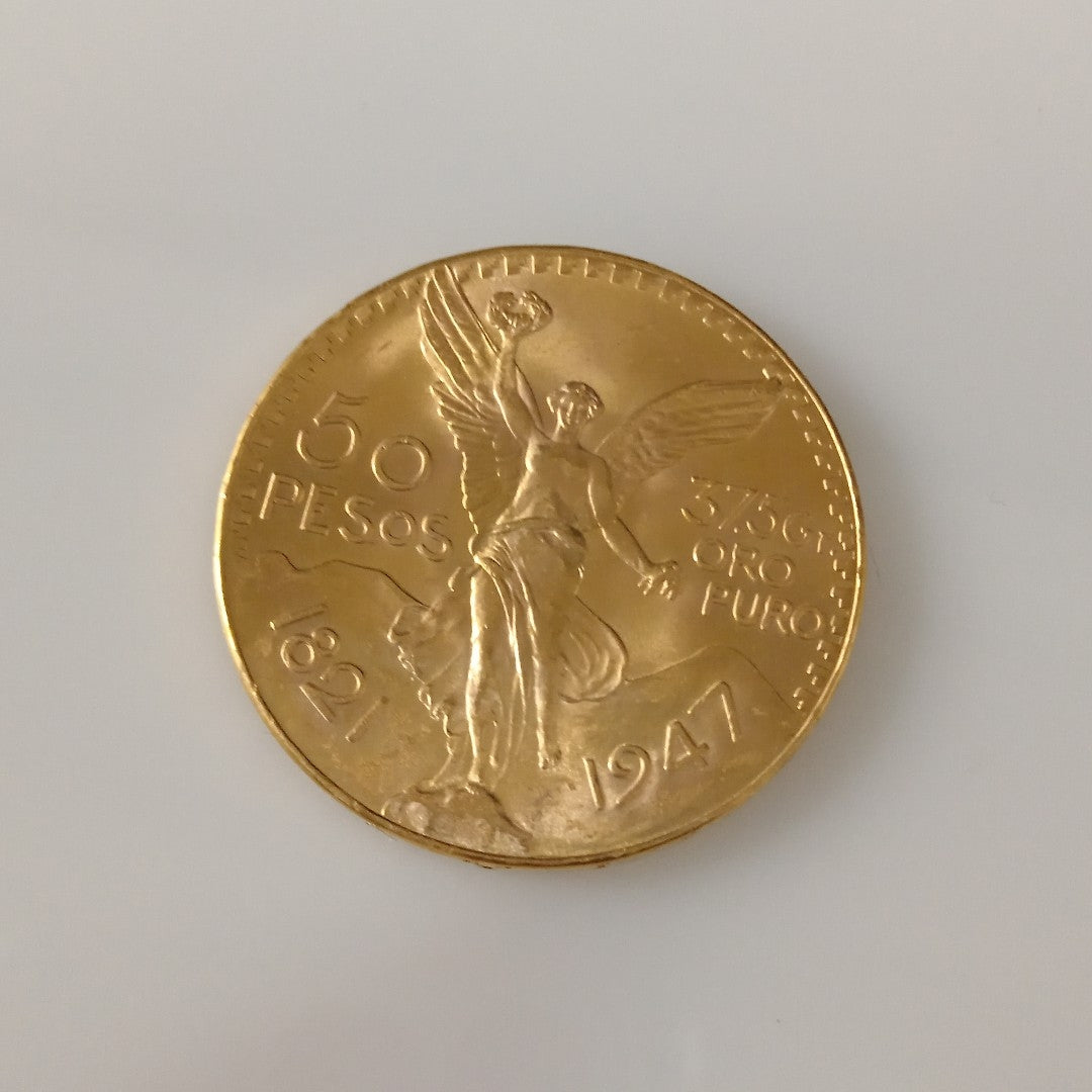 K1 41,60 GRMS - DTO. 0,00 GRMS - 21 K - AVALÚO 76003,20 * IDENTIFICACIÓN  MONEDA NOMINATIVA * MONEDAS PESOS  50 PESOS (SEMINUEVO)