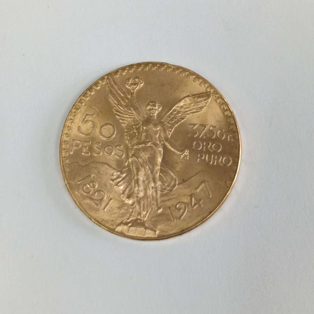 K1 41.6 GRMS - DESC.  0 GRAMOS - 21 K - AVALÚO  77126.4 * * IDENTIFICACIÓN  MONEDA NOMINATIVA. * MONEDAS PESOS  50 PESO (SEMINUEVO)