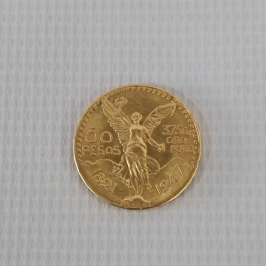 K1 41,60 GRMS - DTO. 0,00 GRMS - 21 K - AVALÚO 76003,20 * IDENTIFICACIÓN  MONEDA NOMINATIVA * MONEDAS PESOS  50 PESOS (SEMINUEVO)