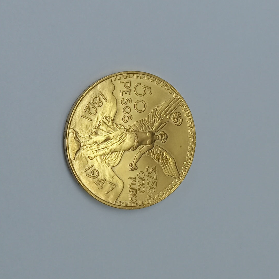 K1 41.6 GRMS - DESC.  0 GRAMOS - 21 K - AVALÚO  69638.4 * * IDENTIFICACIÓN  MONEDA NOMINATIVA. * MONEDAS PESOS  50 PESO (SEMINUEVO)