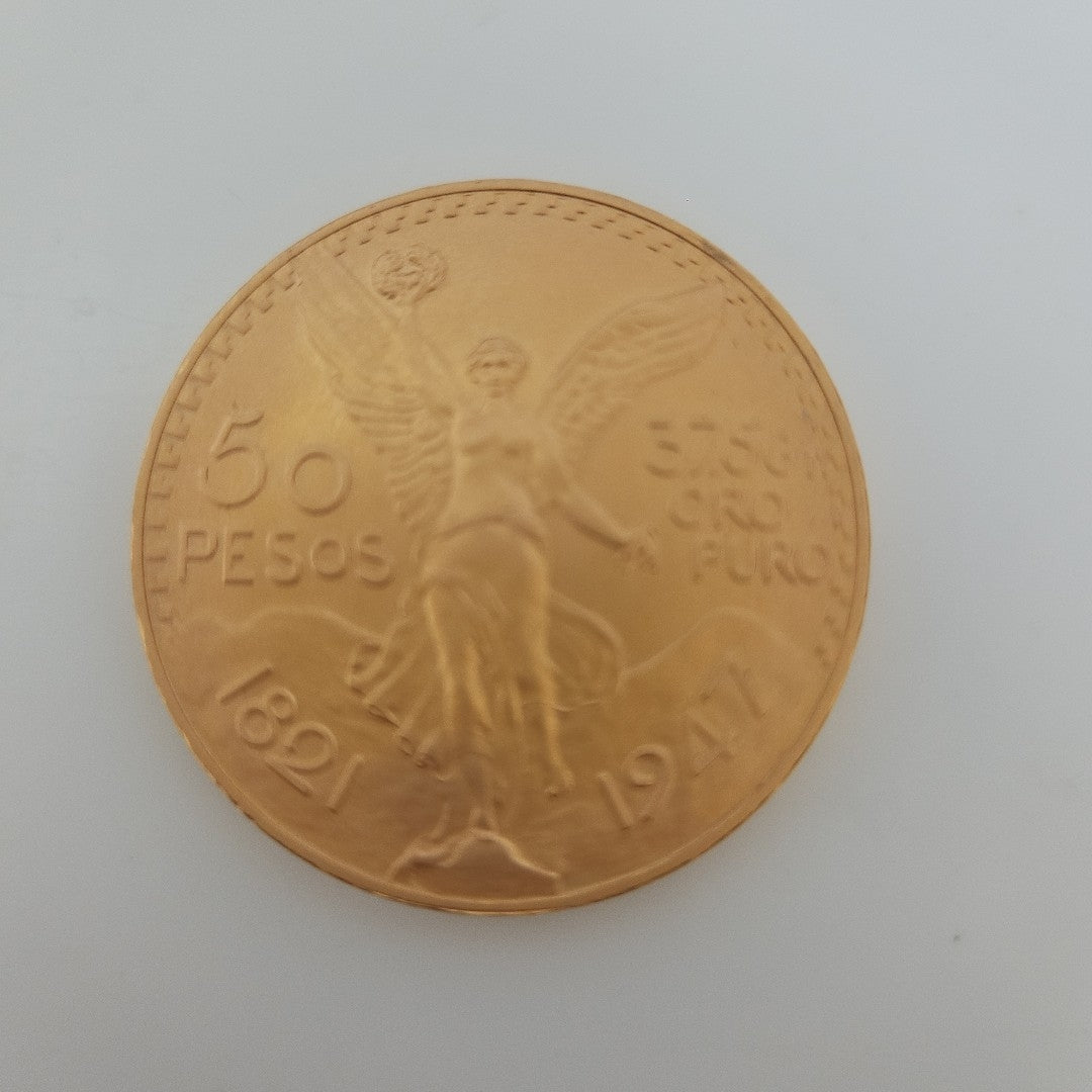 K1 41,60 GRMS - DTO. 0,00 GRMS - 21 K - AVALÚO 76003,20 * IDENTIFICACIÓN  MONEDA NOMINATIVA * MONEDAS PESOS  50 PESOS (SEMINUEVO)